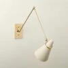 Aldus Ivory And Polished Brass Articulating Wall Sconce -marin sHOP AldusIvNPldBrsArtlngScncSHF22