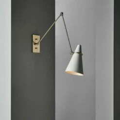 Aldus Ivory And Polished Brass Articulating Wall Sconce -marin sHOP CB2FA22 47D light