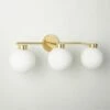 Marra 3-Bulb Polished Brass Globe Vanity Light 1 Marra 3-Bulb Polished Brass Globe Vanity Light -marin sHOP MarraPldBrs3BulbVntyScncSHS23